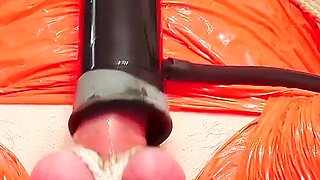 Merciless Cock Milking (tight Shiny Red Plastic Mummificaton and Remote Anal Stimulation)