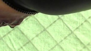 Pee in spandex siut on balcony above bar