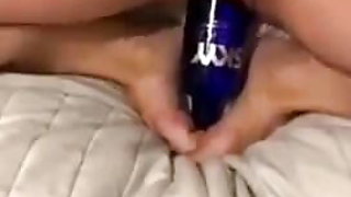 Watch Emma's Extreme Stretching Session with a Vodka Bottle - You Won't Believe How deep She Goes!