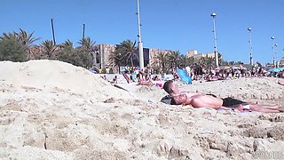 Blonde Lesbians' Public Beach Striptease Ignites Desire