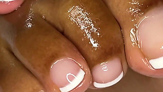 MILF Rubs Oil All Over Her French Pedicure Feet