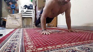 Old Man Streching his Body During Hot Workout