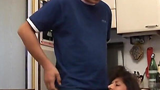 Dirty Mom Gets Fucked in the Kitchen