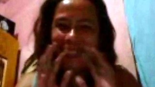 Filipina MILF Helps a Man Cum on Webcam