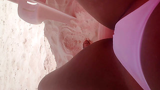 Big ass Latina fucking on the beach while everyone watches her pussy