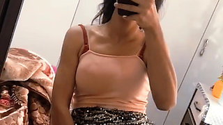 A Turkish woman in front of the mirror who asks when are you me?
