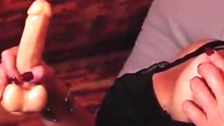 Hot MILF Relaxes in the Room Fucking Her Holes with a Big Dick