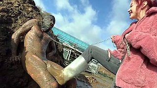 Extreme ballbusting in the mud Miss Eva Ray