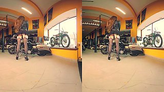 Leggy Redhead Gets Naked on Her Bike