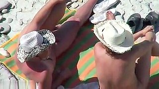 Mature nudist couple caught fucking at the beach