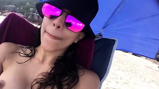 First-time Nudist Hesitates to Undress on Beach
