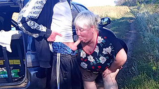 Stepmom holds my dick while I pee and then sucks it in public