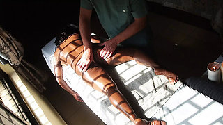 Ebony MILF Gets Oiled Up for a Special Massage with Older Man