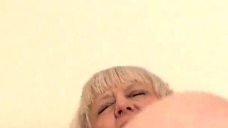 Playing on the bed with my sex toy