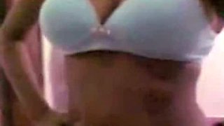 Naughty and hot busty amateur Indian teen shows off her breasts in the bedroom