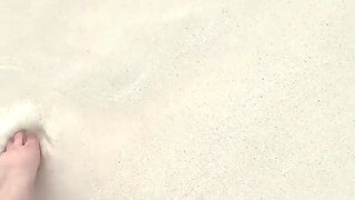 Running my bare feet on the white beach sand by the ocean.