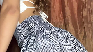 Innocent Girl with a Tender Face Masturbates Her Pussy in a Miniskirt