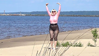 Funny MILF with Nylon Ass and Tits on Beach