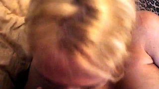 Stacked blonde cougar sucks and strokes a hard dick in POV