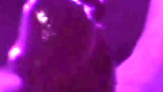 Young Girl Using Her Feet to Play with the Dildo While Masturbating