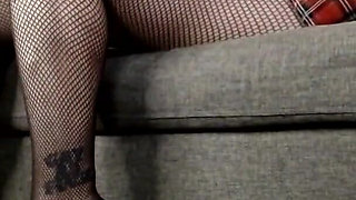 Sexy Black Fishnets Legs Crossed