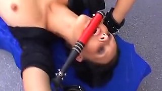 Attractive German babe tied up and fucked by a dildo