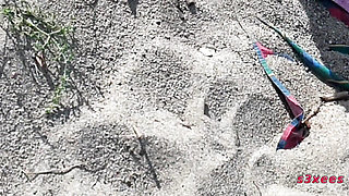 She shows her ass on the beach of Cap d'Agde and jerks off her pussy and then her boyfriend's cock with voyeurs
