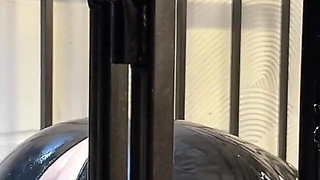 Anal Stretching a Caged Gimp
