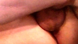 Big tit brunette amateur fucks a dildo close up