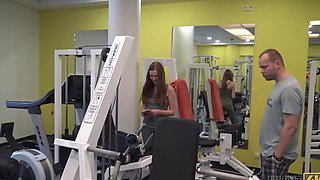 Kinky redhead Linda Sweet spreads legs to have sex in the gym