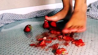 Amateur femdom mistress crushing strawberries barefoot