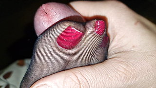 Handjob with wife's black nylon feet - black polish on toenails