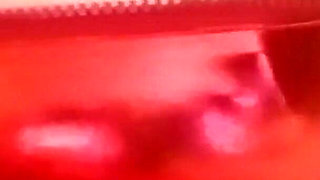 Cougar MILF in a hot red metallic catsuit with huge tits out for play