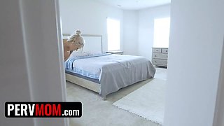 Hot big boobed milf Nina Elle sucks her stepson's shaft while on the smartphone