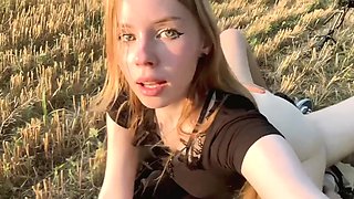 Cute girl met a stranger in the meadow and fucked him