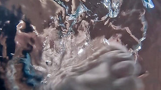 Cool off - Teen strips naked in swimming pool, underwater cam