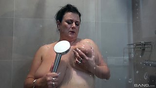 Big natural tits shower scene with Miranda Steel's soapy action