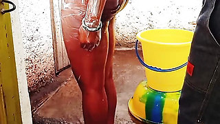 Outdoor bathing my pregnant girlfriend in dirty environment.
