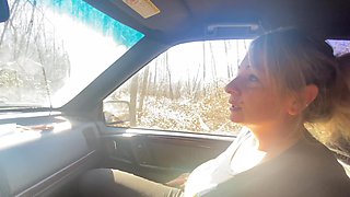 A couple making love in a car in the forest