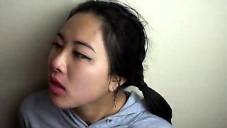 Young asian teen gives a face fucking blowjob