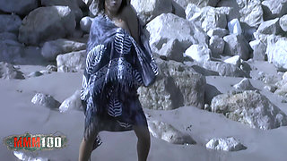 Lovely Little Oriental Betty Removing Clothes on the Beach