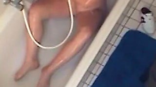 Sexy chubby amateur fucks herself in the bathroom