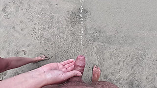 Girl helps to hold the dick while peeing public