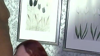 Redhead BBW gets her pussy fisted and sucks cock