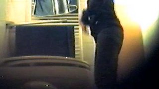 Girl using the toilet and filmed by voyeur 1