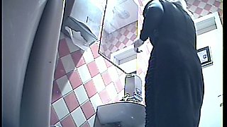 Blonde white stranger woman in the public toiletroom pisses