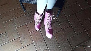 Sitting on a Chair in Pantyhose and High Heeled Boots