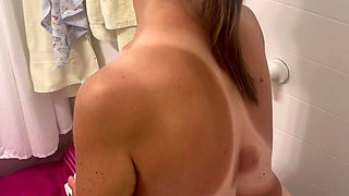 Mature Marie undressing using toilet,showering and drying off