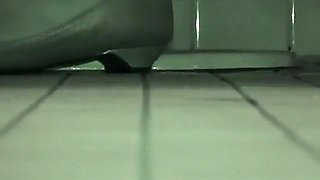 Spy device installed in a public toilet cabin