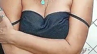 Lonely Hostess in the Kitchen Shows the Beauty of Her Old Sexy Body in Front of a Webcam
